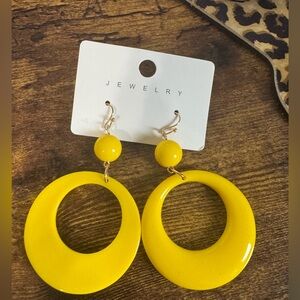 Bright yellow plastic earrings